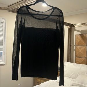 Armani Exchange black sweater with mesh neck and sleeves.